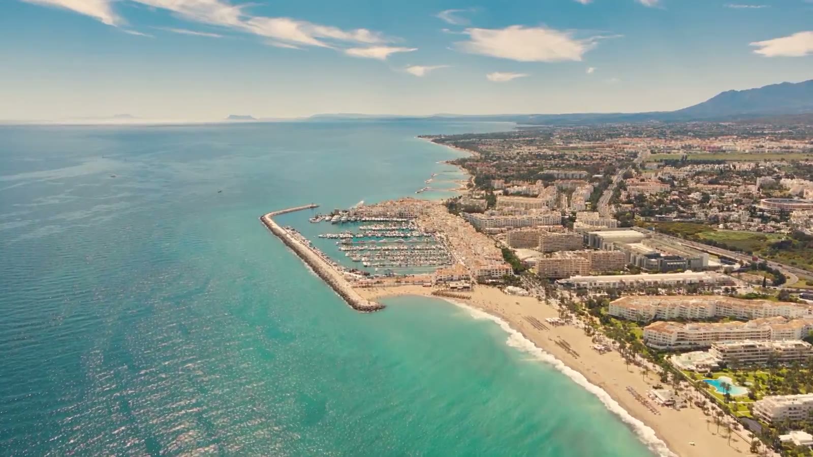Aerial view of the Marbella coast, marina and town
