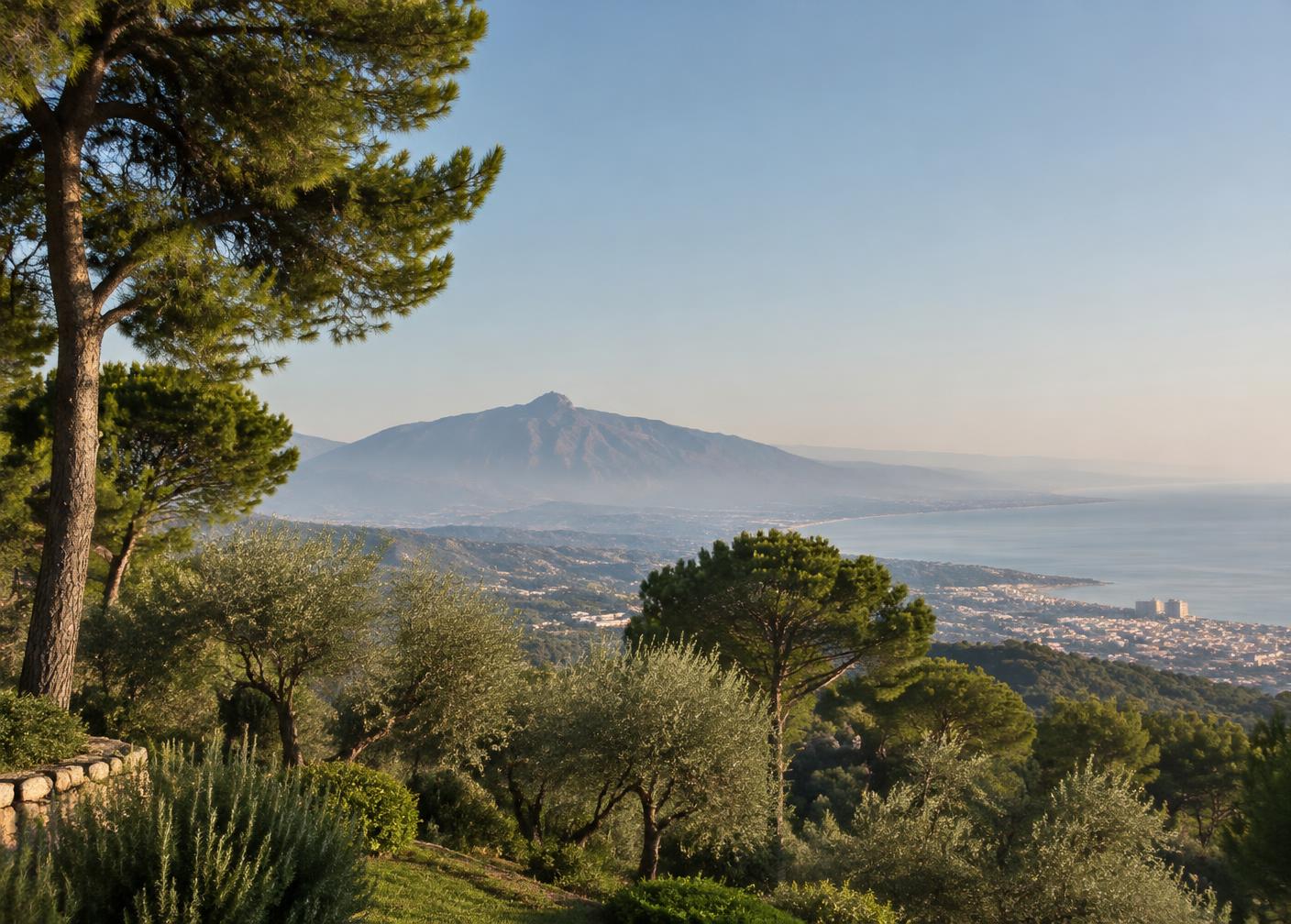 Marbella coastline at golden hour with the mountains behind